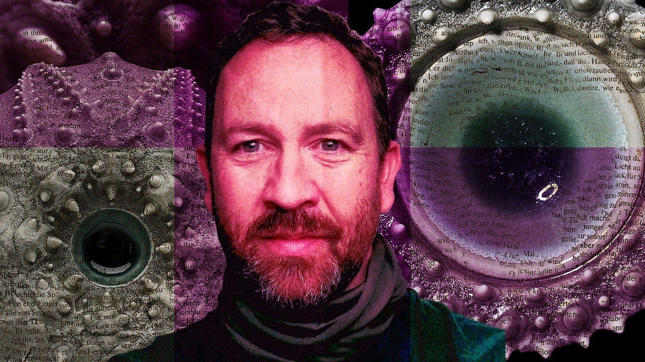 A collage of artist Darren Cassidy. His headshot is in the centre, and there are examples of his ceramics in the background. There is a purple hue to the collage.